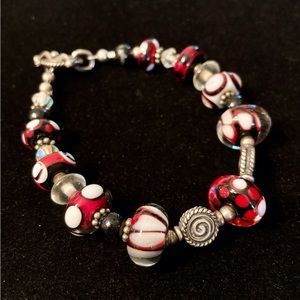 Handcrafted bracelet using 925 Sterling and a handcrafted set of lamp work beads